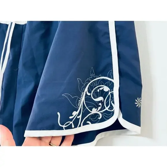 Athleta Pacific Board Shorts Large L Navy Blue White Trim Floral Graphic Swim - Picture 2 of 7